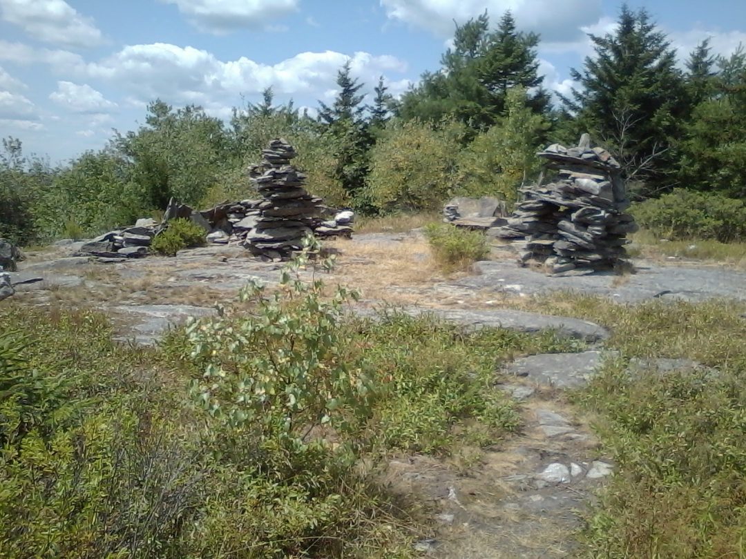 Stone piles on the ridge of Temple Mountain. Part of the old ski area? Definitely augmented by amateur rock artists now.