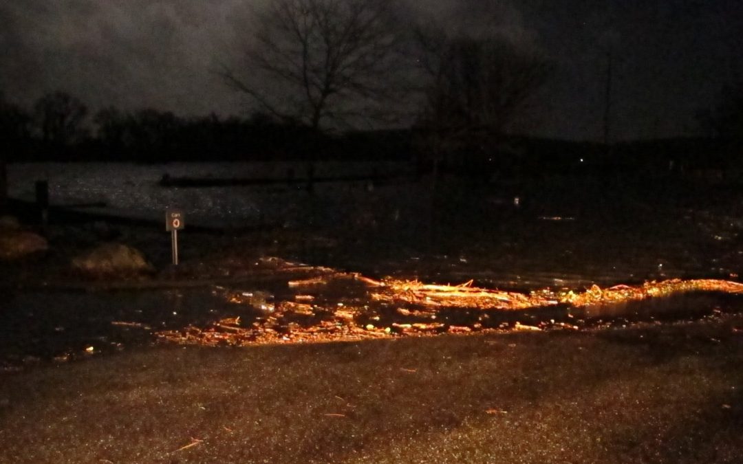 Full moon over flooding river