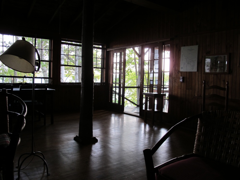Light from Squam Lake reaches into the living room of Longhouse